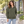 American Apparel RF497 in Lieutenant, a stylish woman aged 30 at a modern tree-lined urban walkway with tasteful architectural backgrounds and bright diffuse daylight; illustrative lifestyle mockup