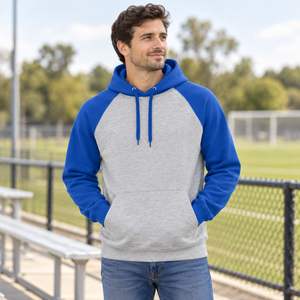 ATC ATCF2550 Athletic Heather/Royal unisex fleece — sports field lifestyle photo