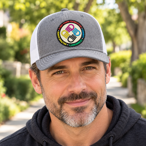 A Tiny Town Foundation Richardson 112 Trucker Cap — Heather Grey/White — lifestyle mockup