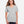 CORE365 CE111W Women's Fusion ChromaSoft™ Performance T-Shirt, model front view - Platinum