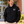 Adult teacher wearing Cedarcrest Elementary School staff pullover hoodie, white crest left chest and STAFF upper sleeve