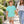 Comfort Colors 9018 Youth Garment-Dyed Heavyweight T-Shirt in a garden courtyard
