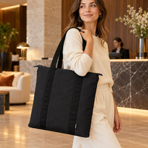 Comfort Colors CCNT0 Nomad Carry-All Tote carried in a hotel lounge