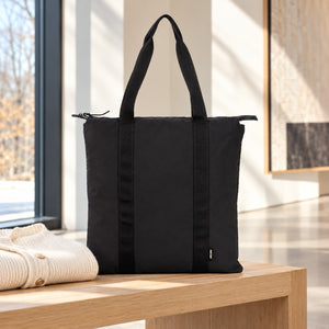 Comfort Colors CCNT0 Nomad Carry-All Tote on an oak gallery bench