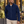 Model wearing the CORE365 88184 men's soft shell jacket outside a café - Classic Navy