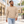 Man wearing the CSW 24/7 L00540 Sand crewneck sweatshirt in a modern shopping mall