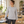 Woman wearing a CSW 24/7 Breeze S05615 long sleeve T-shirt in Athletic Grey Heather at a Pilates studio