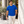Man wearing the CSW 24/7 Sprint S05650 T-shirt in Royal on a city café terrace