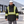 CX2 L01275 Kenworth 5-in-1 outer parka in Black, with detachable hood, snap storm flap and reflective bands — lifestyle view
