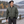 Model wearing the CX2 L09300 men's insulated bomber jacket in Olive — lifestyle photo