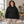 Just Like Hero HERO-2120 Unisex Drop Shoulder Hoodie in Black, lifestyle view on an adult model