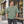 Just Like Hero HERO-300 Unisex Heavy Oversized T-Shirt in Dusty Green, lifestyle view on an adult model