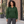Just Like Hero HERO-4020 Unisex Quarter Zip Sweatshirt in Forest Green, lifestyle view on an adult model
