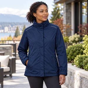 Model wearing the CORE365 Women's 3-in-1 Jacket with Fleece Liner – 78205 in a lifestyle setting - Classic Navy