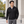 Model wearing the Adidas Men's Ultimate365 Wind Quarter-Zip Pullover – A2027 in a lifestyle setting - Black