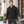 Model wearing the Adidas Men's Half-Zip Hooded Anorak – A607 in a lifestyle setting - Black