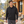 Model wearing the Adidas Men's Half-Zip Hooded Anorak – A607 in a lifestyle setting - Black