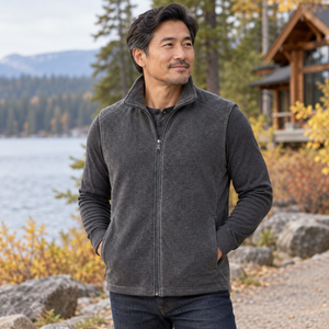 Model wearing the Columbia Steens Mountain™ Vest in a lifestyle setting - Heather Grey