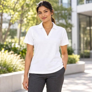 CORE365 CE106W Women's Resolve CVC Performance Pique Polo — undecorated garment in a premium lifestyle setting