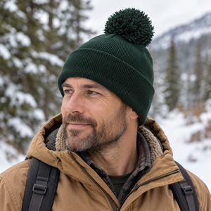 Sportsman SP15 Embroidered 12" Solid Cuffed Pom Pom Toque in Forest Green, lifestyle view