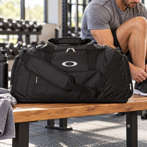 Embroidered Gym Duffel Bag shown in use, with a blank area for custom decoration