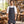 Four-Pocket Jeans Stitch Denim Bib Apron shown in use, with a blank area for custom decoration