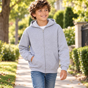 Gildan 18600B Youth Full-Zip Hooded Sweatshirt — blank garment in a lifestyle setting
