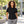 Gildan 64800L Softstyle® Women's Pique Polo — undecorated garment in a premium lifestyle setting