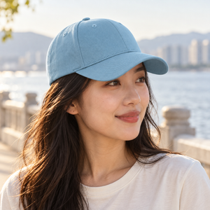 KOI1831 cotton twill snapback cap in Blue Mist worn in an everyday lifestyle setting
