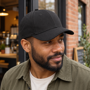 KOI1831 cotton twill snapback cap in Onyx worn in an everyday lifestyle setting