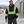 Model wearing the CX2 Hivis Long Haul Polyester Pullover Hoodie in a lifestyle setting - Black