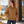 Model wearing the Harriton Unisex ClimaBloc® Heavyweight Hooded Full-Zip Jacket – M722 in a lifestyle setting - Duck Brown