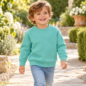 Rabbit Skins 3317 Toddler Fleece Crewneck Sweatshirt — blank garment in a lifestyle setting