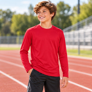 Team 365 TT11YL Youth Zone Performance Long Sleeve T-Shirt — blank garment in a lifestyle setting