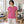Woman wearing the M&O 3540 Heather Fuchsia crewneck T-shirt in a bright Pilates studio