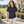Woman wearing the Muskoka Trail S05751 Fairway Ladies Cotton/Poly Jersey Polo in a realistic lifestyle setting - Midnight Navy