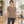 Woman wearing the Muskoka Trail S05918 Liberty Ladies Poly/Cotton Crewneck T-Shirt in a realistic lifestyle setting - Melange Taupe