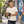 Next Level 3604 Unisex Cotton Ringer Tee in Natural/ Maroon — man photographing street murals in a Montreal neighbourhood