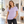 3910 Women's Cotton Relaxed Tee in Lavender — woman in a small minimalist art gallery