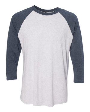 Next Level 6051 Unisex Triblend Three-Quarter Raglan Tee in Indigo Sleeves/ Heather White Body — supplier front view