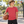 Next Level 6310 Youth Triblend Tee in Vintage Red — 12-year-old boy at an outdoor community basketball court, ball at his side