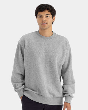 Next Level 9007 Unisex Heavyweight Crewneck Sweatshirt in Heather Grey — supplier front view