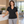 Woman wearing the Nike 637165 polo in Black, realistic lifestyle photo