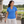Woman wearing the Nike 637165 polo in Brisk Blue, realistic lifestyle photo