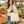 Woman grocery shopping with a Q-Tees QTB6000 natural cotton tote with forest handles