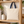 Q-Tees QTB6000 natural cotton tote with navy handles on an oak pantry shelf