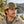 Richardson 112FP Five-Panel Trucker Cap in Army Olive Green / Tan – lifestyle view 1
