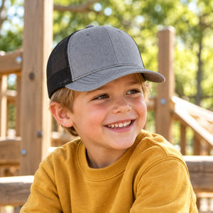 Richardson 112Y Youth Trucker Snapback Cap in Heather Grey / Black – lifestyle view 3