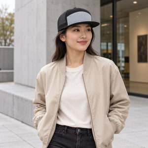 Richardson 168 Seven-Panel Trucker Cap in Heather Grey / Black – lifestyle view 2